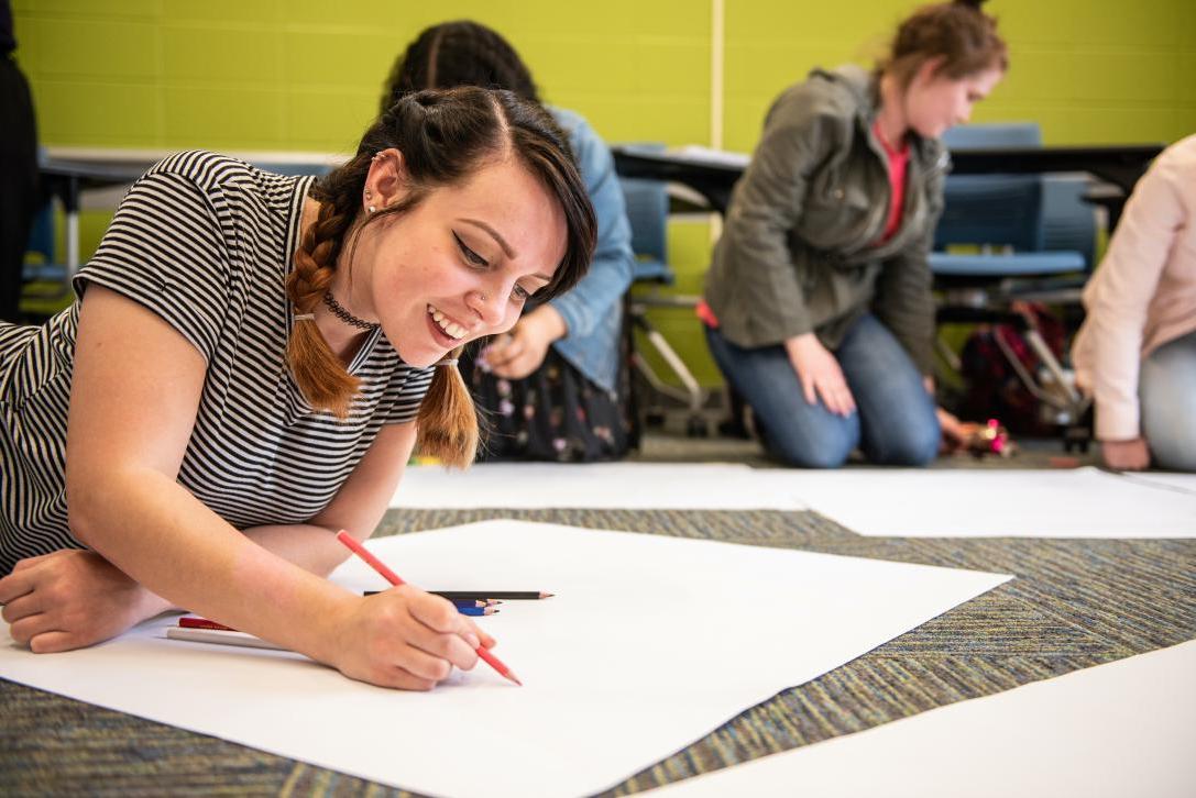 Students work on a project in an English class.