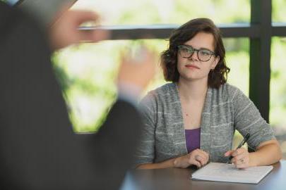 Student listening to lecture.